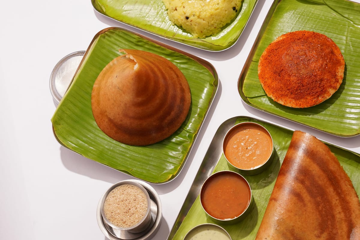 Traditional South Indian thali with rice, sambar, and sides